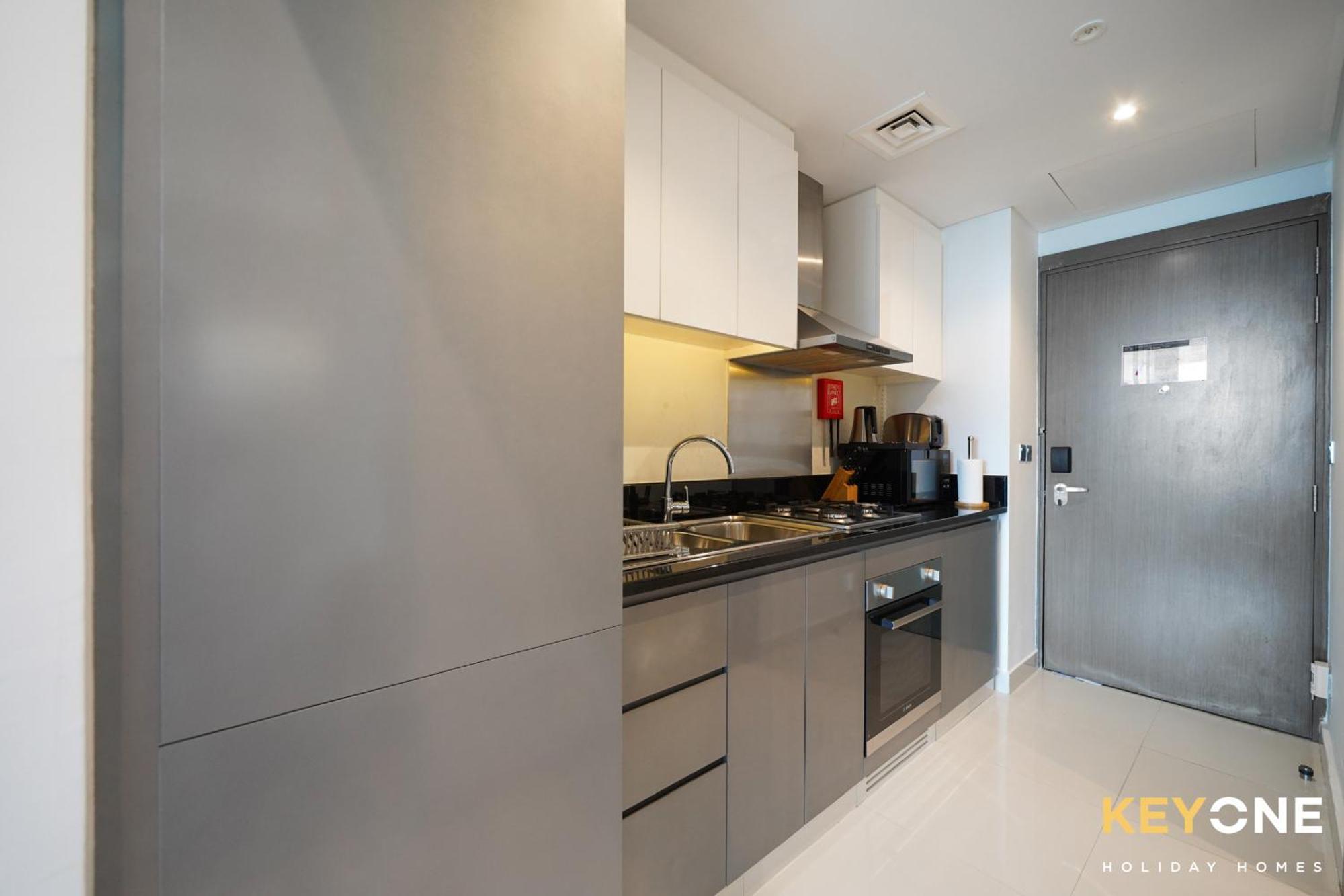 Sleek Studio In Prive With Stunning Canal View ดูไบ ภายนอก รูปภาพ